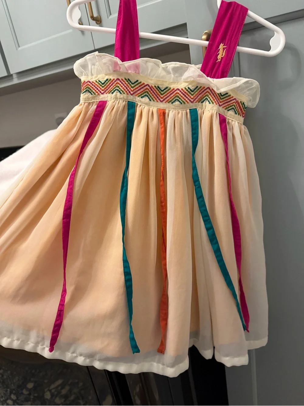 Well Dressed Wolf Cream Chiffon Dress with Pink Straps and Teal & Orange Ribbons